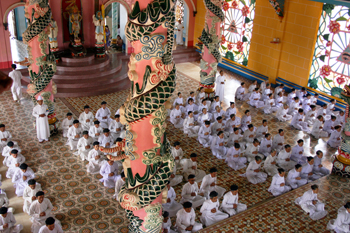 Inside the Cao Dai temple, during one of two daily services
