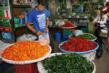 peppers in an outdoor produce market along the Chao Phrya River