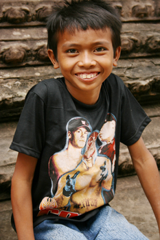 A big, toothy smile from a Cambodian boy