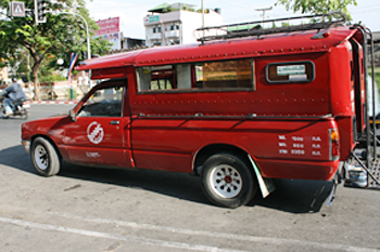 In Chiang Mai the taxis are red pickup trucks called songthaews