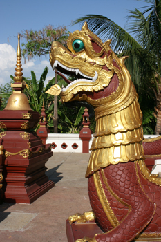 Fierce red dragons guarding the entrance at Wat Montien in Chiang Mai Thailand