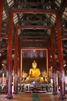 Built entirely of antique teak, the interior of Wat Pan On in Chiang Mai Thailand