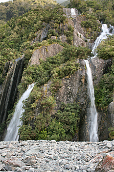 Twin waterfalls on the way to the foot of the Franz Josef glacier New Zealand