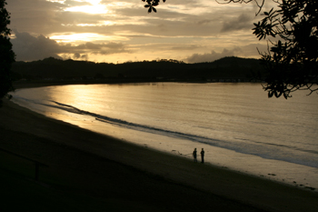 Sunset on Paihia Bay in New Zealand turns water platinum
