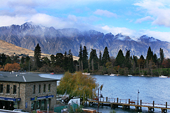 Looking across Queenstown and the lake toward the Remarkable Mountains New Zealand