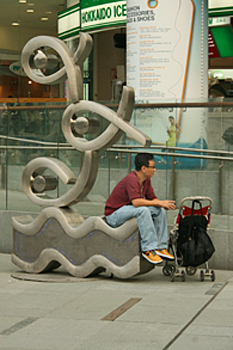 Sculpture in front of a Singapore shopping center