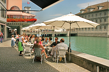 Cafe tables on the shores of the Zurich River Switzerland