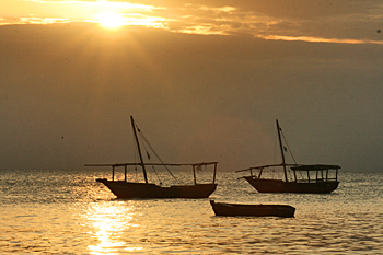 Sunset over Stone Town harbor in Zanzibar
