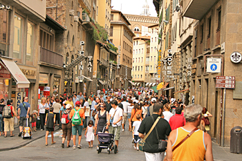 Crowds leading to the Ponte Vecchio in Florence Italy