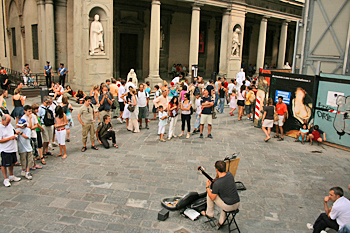 Entertainers in front of the Uffizi Museum n Florence Italy