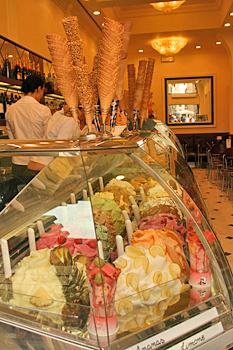 Gelato stores, displaying their delicious ice cream in multicolored heaps in Florence Italy