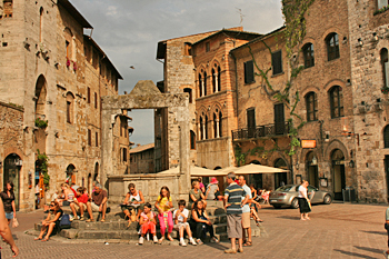 Wishing well in the main piazza in San Gimignano Italy