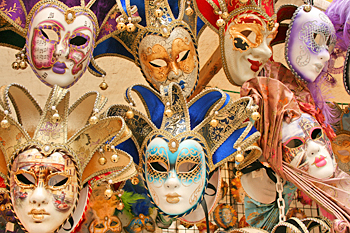 Masks on Rialto Bridge in Venice Italy