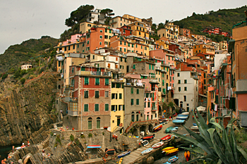 Riomaggiore hangs off the cliff in Cinque Terre Italy