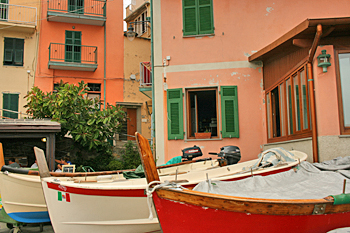 Colorful houses and boats in Manarola in Cinque Terre Italy