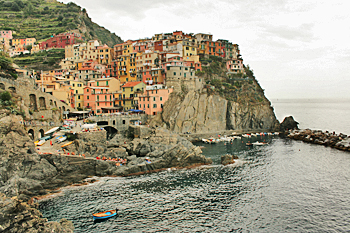 Approaching Manarola on the trail in Cinque Terre Italy