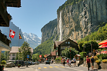Staubbach Falls comes into view at the end of town in Lauterbrunnen Switzerland