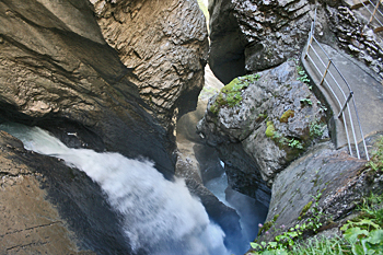 Trummelbach Waterfall emerges from the mountain Switzerland