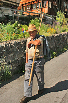Happy mountain farmer in the Swiss Bernese Oberland