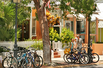 Pastel colored galleries and storefronts line Duval Street in Key West