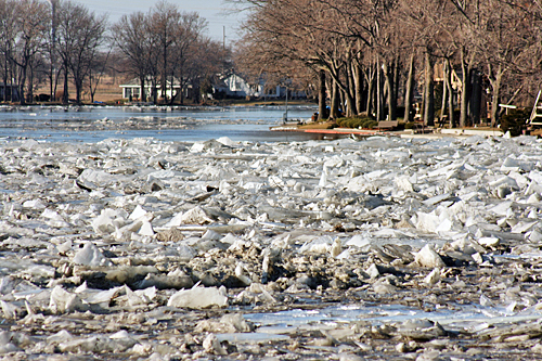 Backed-up ice pushes into the cove, creating a mini-glacier and flooding