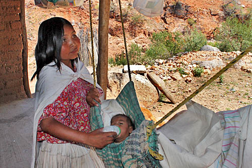 Since her mother died two years ago, this nineteen-year old in the Tarahumara settlement near Batopilas cares for her two children and all her siblings