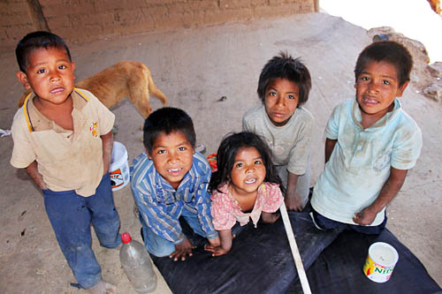 19-year old Tarahumara woman cares for her 5-year old daughter (center) and 1-year old infant, as well as all her siblings in Batopilas