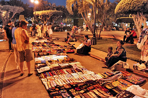 Mayan women sell handicrafts in the Zocalo, wellspring of Merida's culture