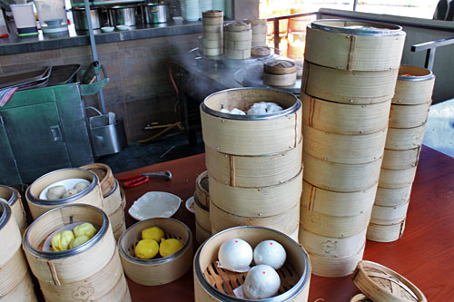 Stacked bamboo steamers full of goodies at a hawker cart in the Viva Food court near my homestay