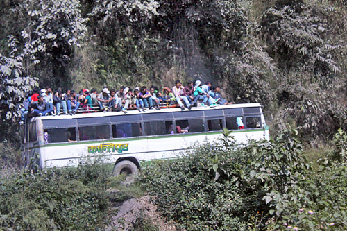 Passengers atop bus during Dashain holiday in Neapal