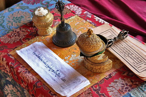 Bells and ancient scripts used in puja