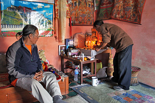 Mediator prepares the altar prior to shamanic ceremony