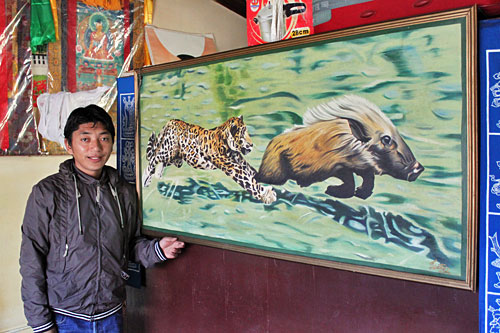 Leopard mural dominates Tseten's small living room