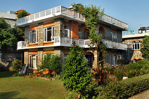 Temple Villa Hotel is surrounded by lovely gardens Pokhara Nepal