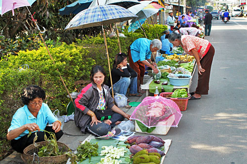 Food vendors line the streets in Chiang Khong, Thailand