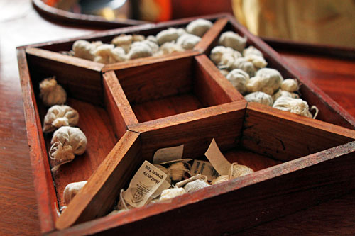 Lao ginger tea balls, served on our Mekong River Cruise boat