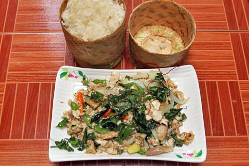 Traditional Lao Padsapao with sticky rice basket