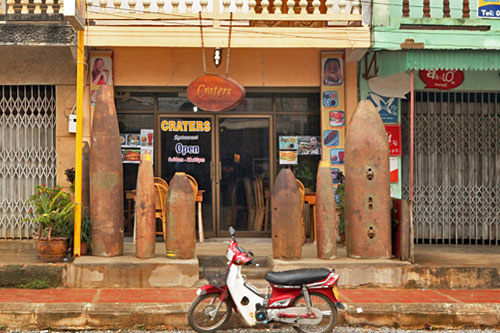 Old bombs stand sentinel in front of Craters Restaurant