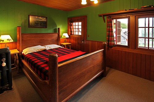Bedroom in the main lodge of Great Camp Sagamore