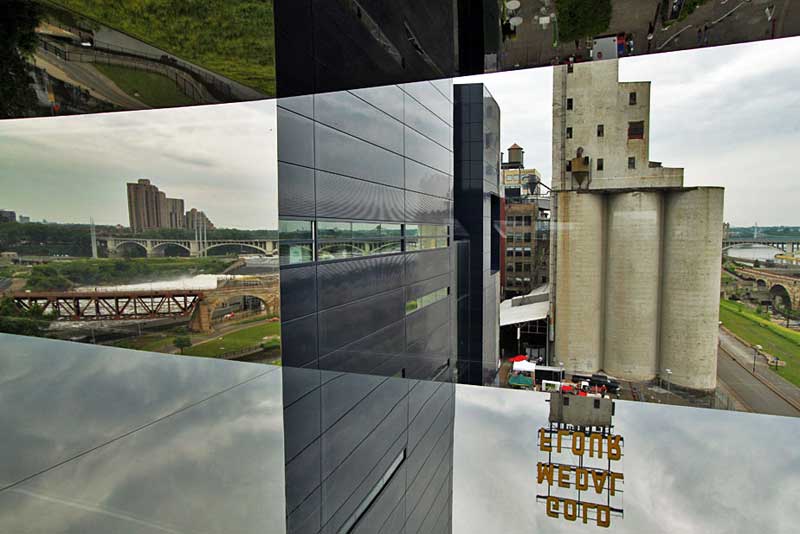 Mississippi Riverfront Reflected in Mirrored Windows on Endless Bridge at the Guthrie Theater, Minneapolis, MN