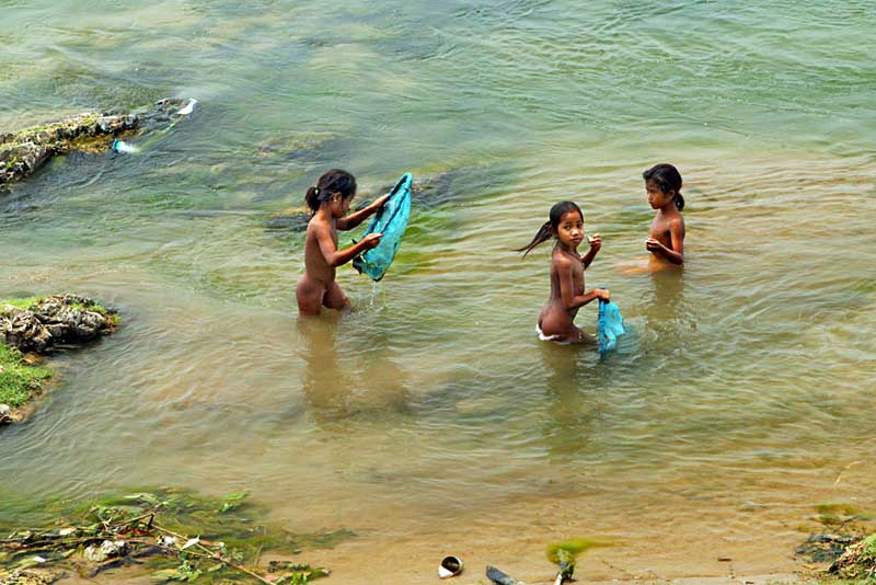 Girls Frolick in Mekong River on Don Khone Island in Southern Laos