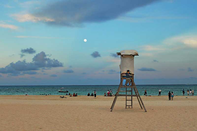 Sunset and Full Moon in Playa del Carmen, Mexico