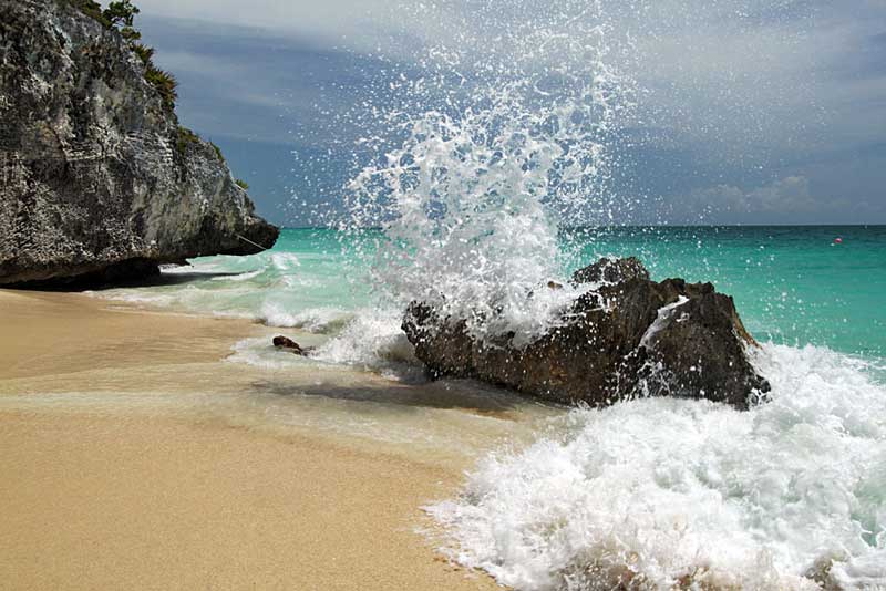 Caribbean Sea Crashes Over Rocks on Tulum Beach on the Maya Riviera, Mexico