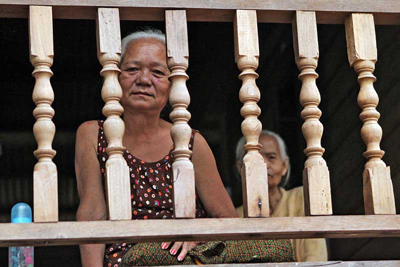 Women On a Balcony in the Remote Village of Duatai in 4,000 Islands, Laos
