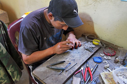 Making silver filigree jewelry in Chordeleg, Ecuador