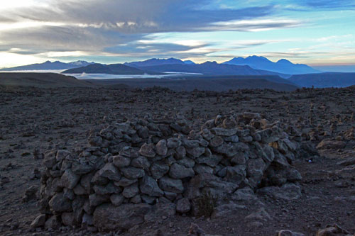 Sunrise at the Mirador de los Volcanes, gateway to Colca Canyon, illuminates ring of volcanoes