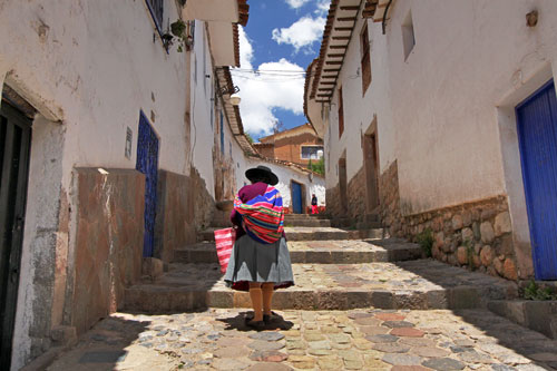 Quechua woman outpaces me on the long climb to the San Blas neighborhood in Cusco