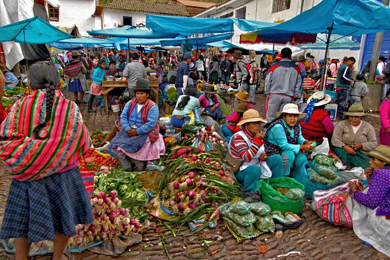 Quechua Sell Produce at the Pisac Market in the Sacred Valley, Peru