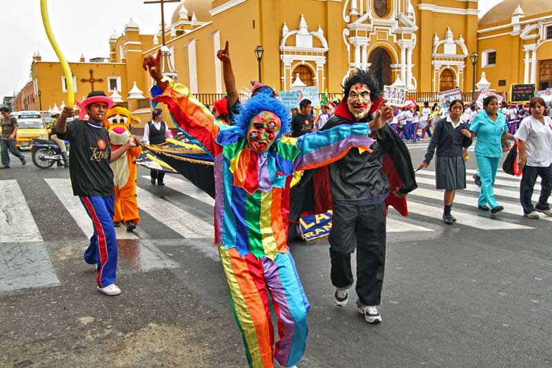 Revelers in Costume Parade Around Plaza de Armas in Trujillo, Peru