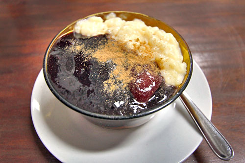 Mazamorra Morada, a classic Peruvian dessert made with purple corn and cinnamon cloves, accompanied by Rice Pudding 